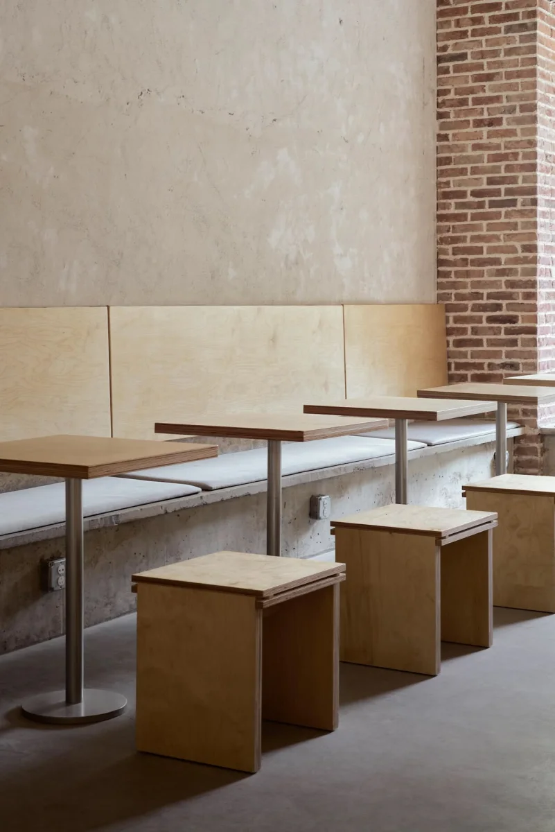 Communal restaurant tables and banquette seating